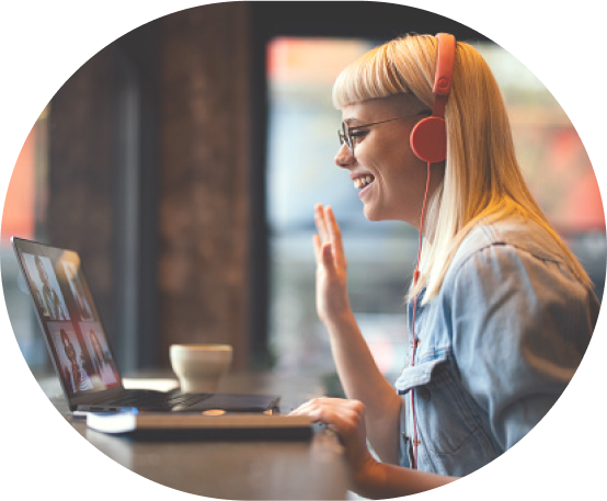 Young woman waving on a video conference call